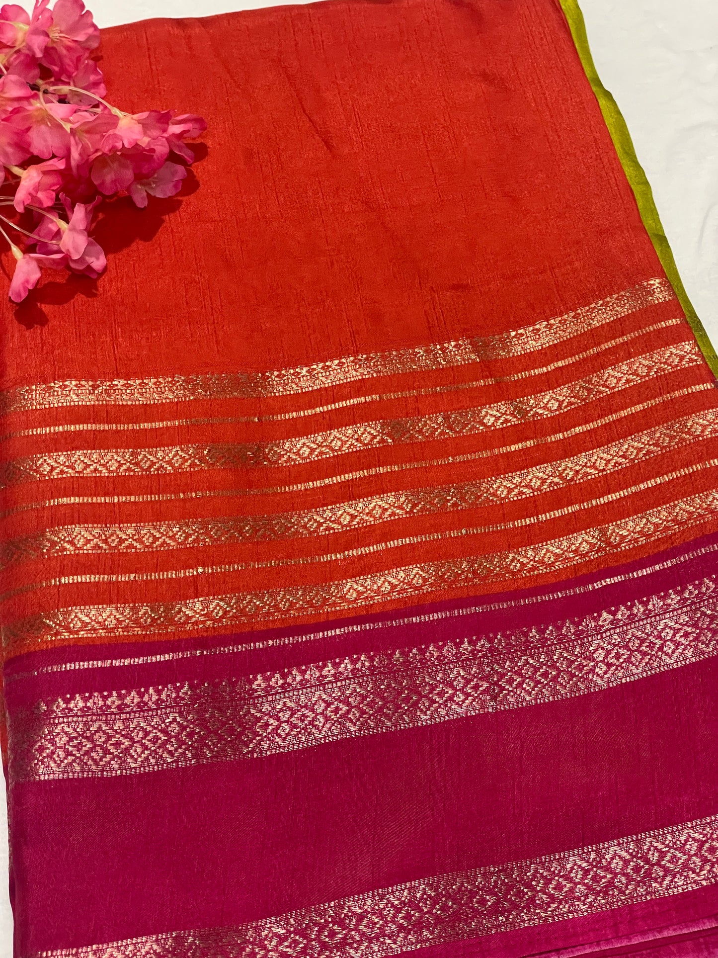 Pink and orange striped Semi Crape Saree