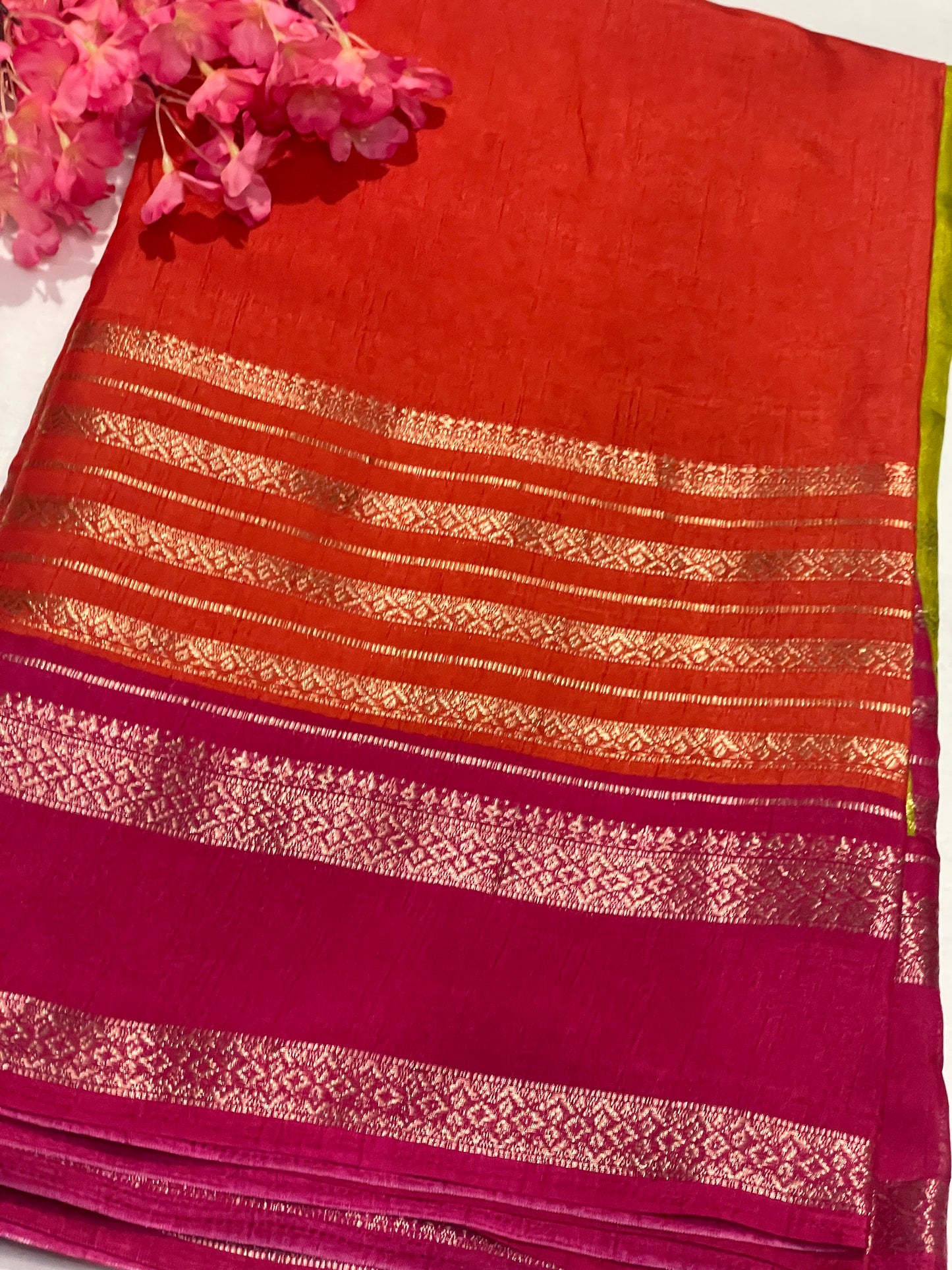Pink and orange striped Semi Crape Saree